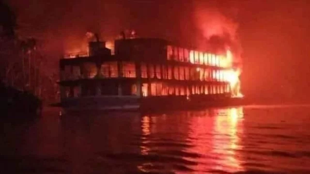 সুগন্ধা নদীতে আগুনে জ্বলছে লঞ্চটি।