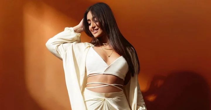 ileana-dcruz-flaunts-golden-glow-in-white-cut-out-number-0001